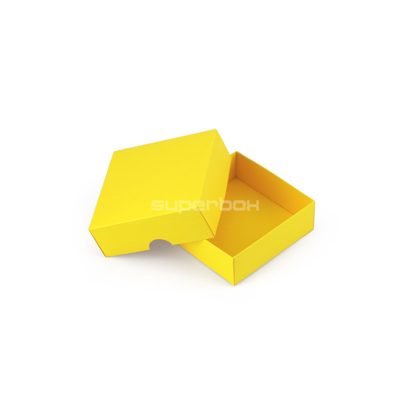 Kleine quadratische gelbe Kartongeschenkbox