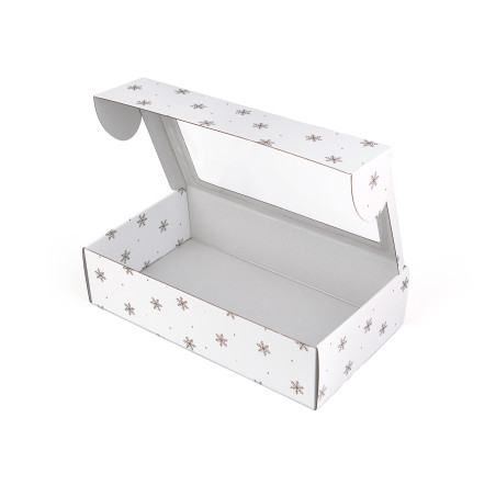 Weiße Geschenkbox mit goldenen Schneeflocken und Fenster