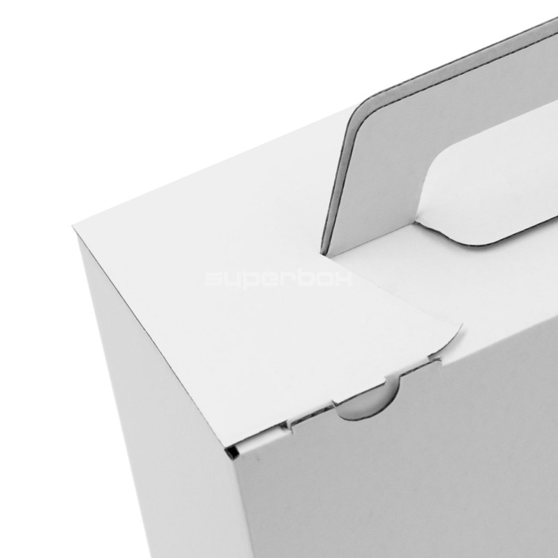 Weiße kleine Koffer-ähnliche Geschenkbox mit Griff