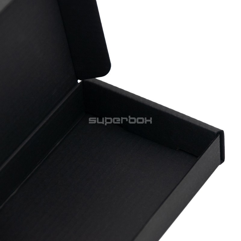 Niedrige längliche schwarze Box für Schokolade Niedrige längliche schwarze Box für Schokolade