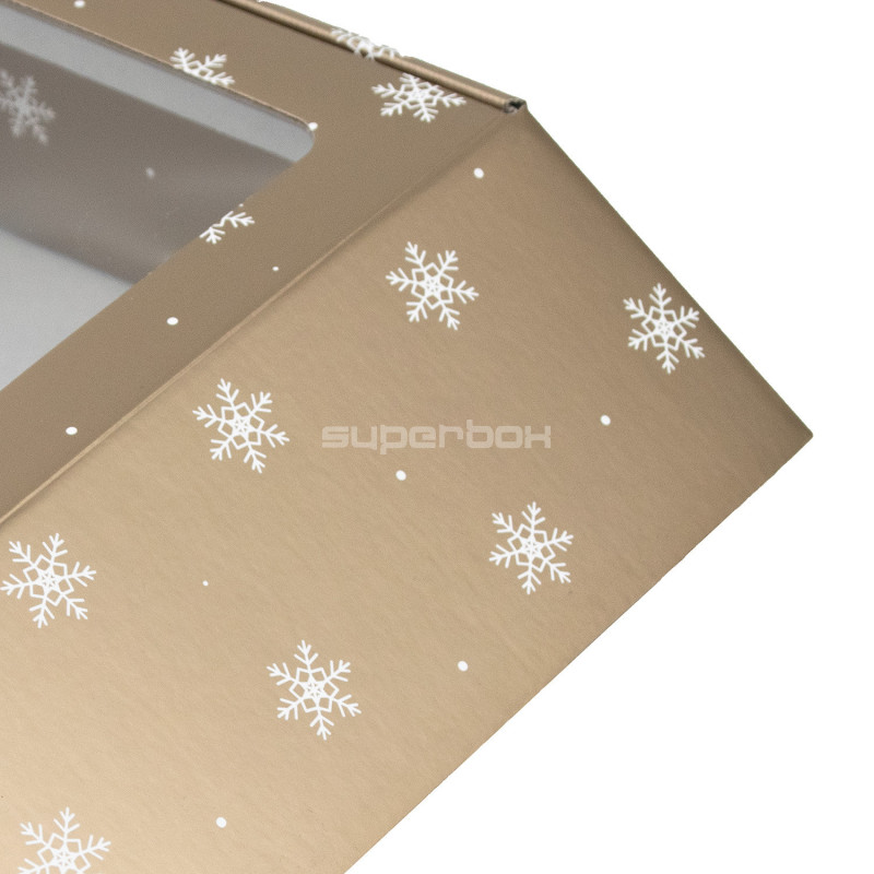 Gedämpft goldene quadratische Geschenkbox mit Schneeflocken