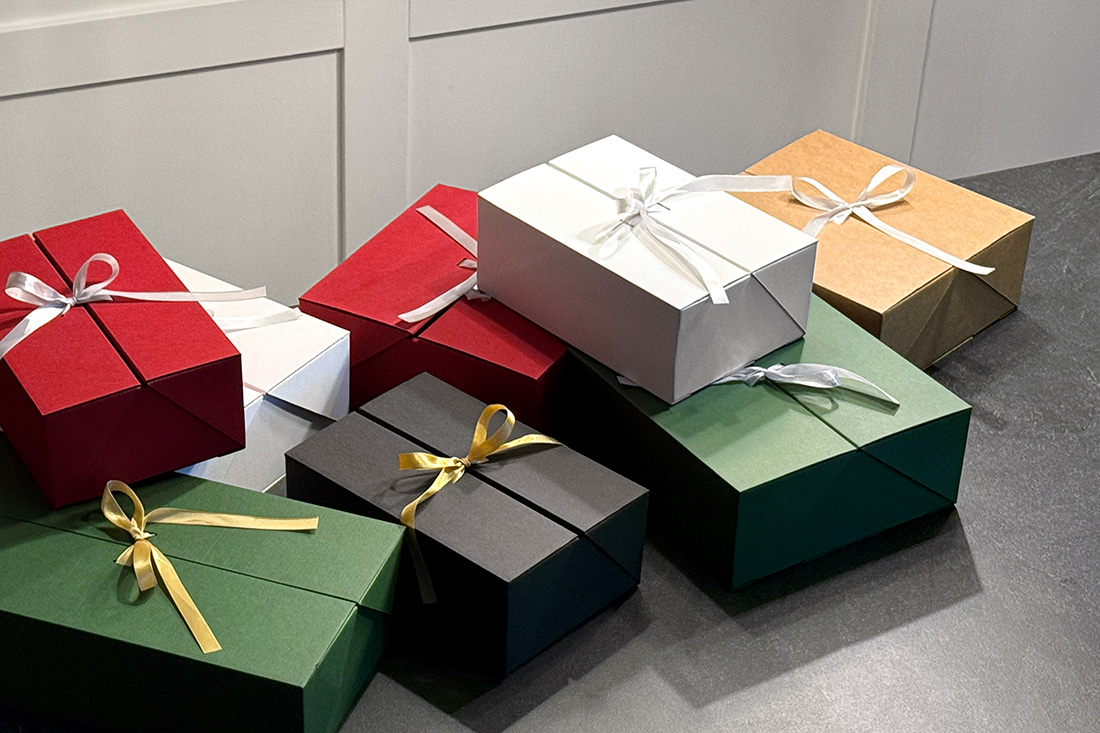 Double Door gift boxes – Christmas packaging with satin ribbons Double Door gift boxes with satin ribbons – red, black, green, and white colors
